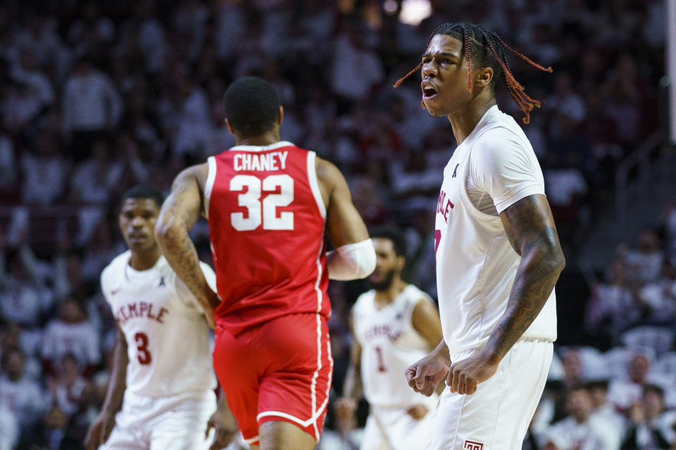 Temple's Khalif Battle, right, reacts after his 3-point basket during the first half of an NCAA college basketball game against Houston, Sunday, Feb. 5, 2023, in Philadelphia. (AP Photo/Chris Szagola)