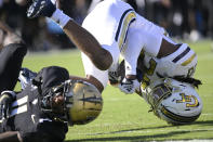 Georgia Tech defensive back LaMiles Brooks (20) comes down with an interception in the end zone on a pass intended for Central Florida wide receiver Ryan O'Keefe (4) during the first half of an NCAA college football game, Saturday, Sept. 24, 2022, in Orlando, Fla. (AP Photo/Phelan M. Ebenhack)
