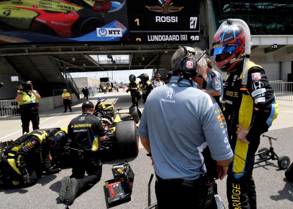 Andretti Autosport with Curb-Agajanian driver Colton Herta (26) stands by his car after leaving the race Saturday, July 30, 2022, during the Gallagher Grand Prix at Indianapolis Motor Speedway.
