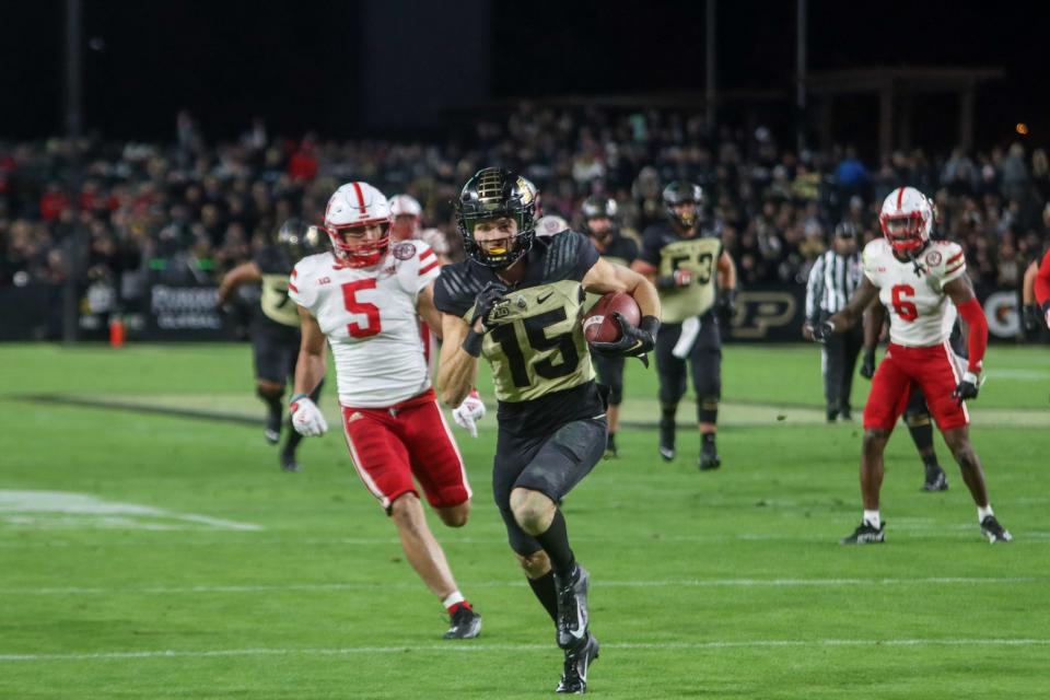 Charlie Jones (15) catches a pass during the NCAA football game, Saturday, Oct, 15, 2022, at Ross-Ade Stadium in West Lafayette, Ind.