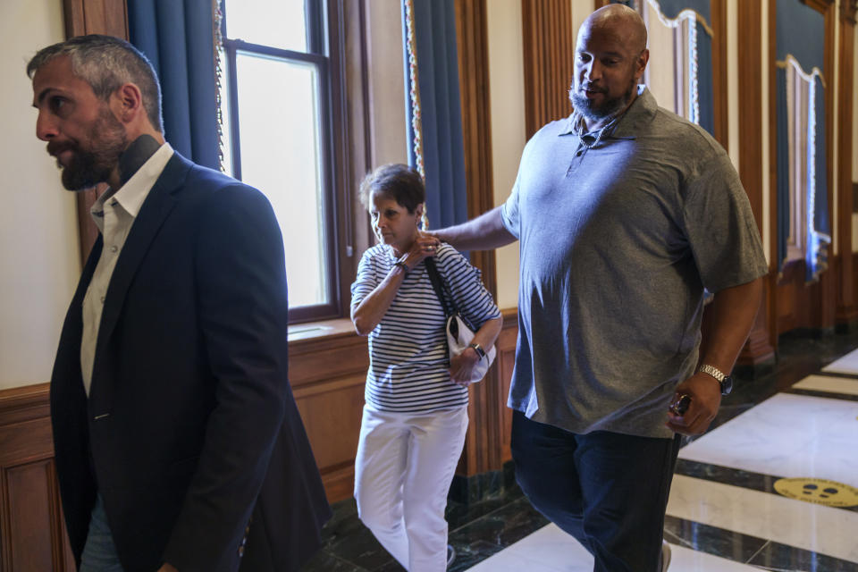 From left, Michael Fanone, a Washington Metropolitan Police Department officer who was attacked and beaten during the Jan. 6, attack on the Capitol, Gladys Sicknick, mother of Brian Sicknick, the U.S. Capitol Police officer who died from injuries sustained during attack on Congress, and Harry Dunn, a U.S. Capitol Police officer who also faced the rioters, arrive leave a meeting with House Minority Leader Kevin McCarthy, R-Calif., at the Capitol in Washington, Friday, June 25, 2021. House Speaker Nancy Pelosi announced Thursday she's creating a special committee to investigate the attack by a mob of Trump supporters who sought to interrupt the certification of Joe Biden's presidential election victory. (AP Photo/J. Scott Applewhite)