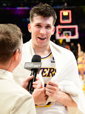 <p>Adam Pantozzi/NBAE/Getty</p> Austin Reaves after the game against the Orlando Magic in 2023