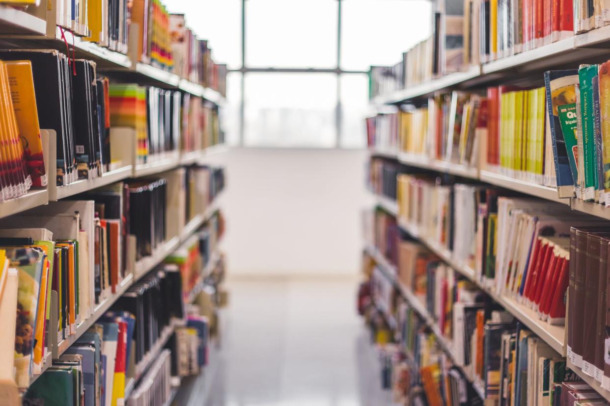 Front view from a book hall in a library. Through this image we can find things about education, study, school, science and much more.