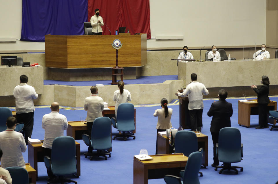 New House Speaker Lord Allan Velasco gestures during his first day at the House of Representatives in Quezon city, Philippines on Tuesday, Oct. 13, 2020. A large faction of Philippine legislators in the House of Representatives elected a new leader Monday in a tense political standoff between two allies of the president. (AP Photo/Aaron Favila)