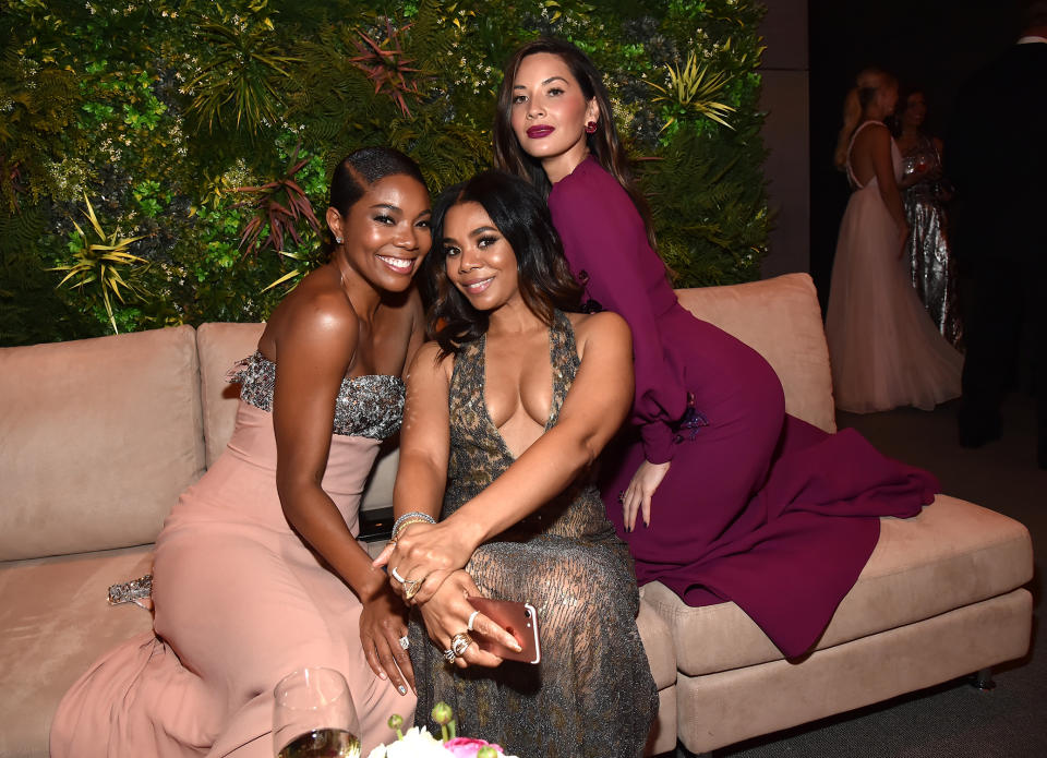 <p>Regina Hall may have been planning a girls’ trip with her party pals Union and Munn at the <em>Vanity Fair</em> party. (Photo: Kevin Mazur/VF18/WireImage) </p>