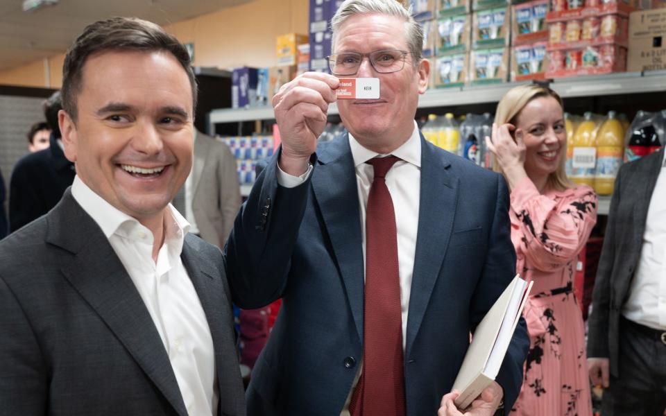 Labour leader Sir Keir Starmer (right) tours an Iceland supermarket in Warrington with executive chairman of the food chain, Richard Walker