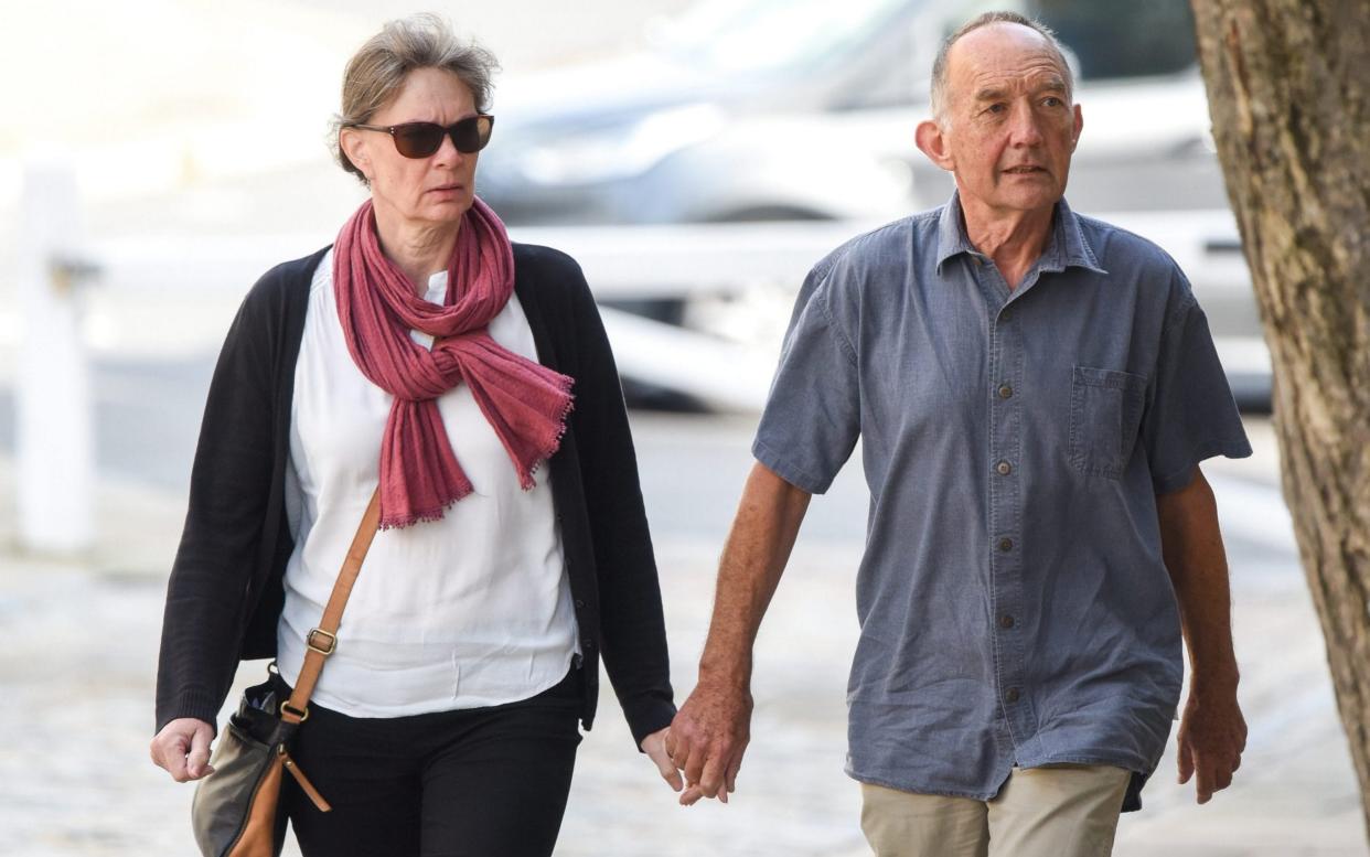 Ralph Snell's son Richard Snell and his partner Alison Henry arrive ahead of the inquest at Winchester Coroners Court.  - Solent News & Photo Agency