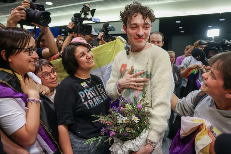 Swiss performer Nemo greeted fans at Zurich Airport after winning the 68th Eurovision Song Contest (ARND WIEGMANN)