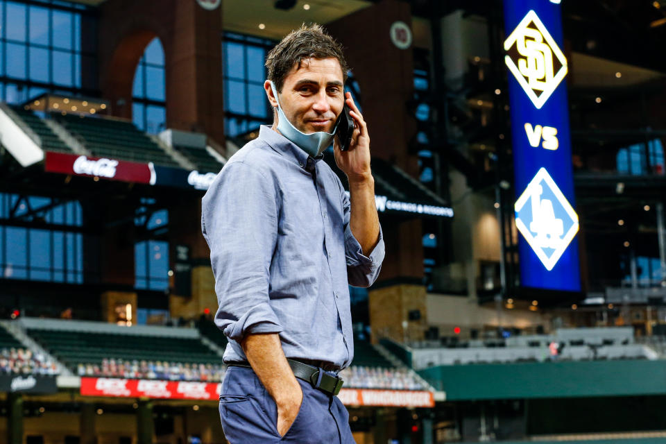 Padres GM A.J. Preller, seen here in Texas during San Diego's NLDS matchup with the Dodgers, is aggressively pursuing more stars.