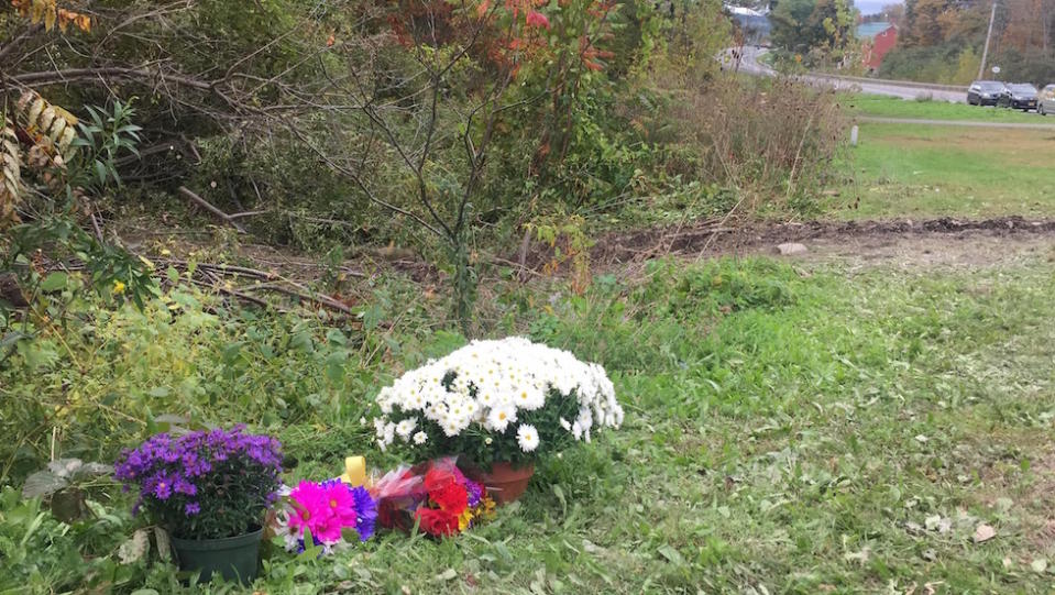 Floral tributes were left at the scene of the crash to those who died (Picture: PA)