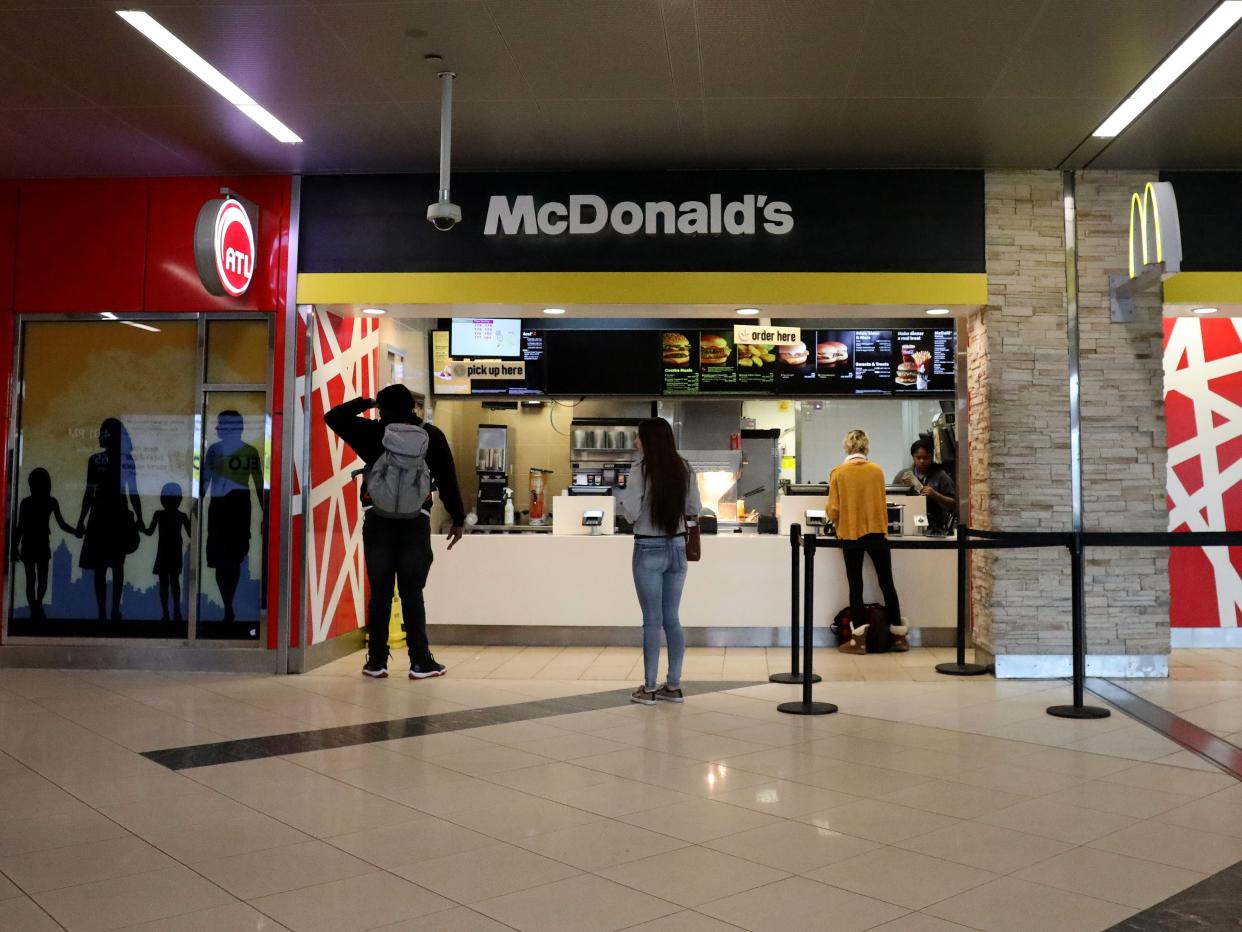 Travelers order food from McDonald's at Hartsfield-Jackson Atlanta International Airport