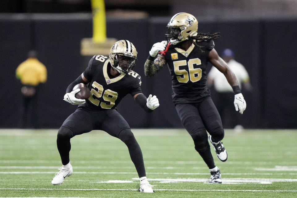 New Orleans Saints cornerback Paulson Adebo (29) runs after intercepting a pass during the first half of an NFL football game against the Chicago Bears in New Orleans, Sunday, Nov. 5, 2023. (AP Photo/Gerald Herbert)