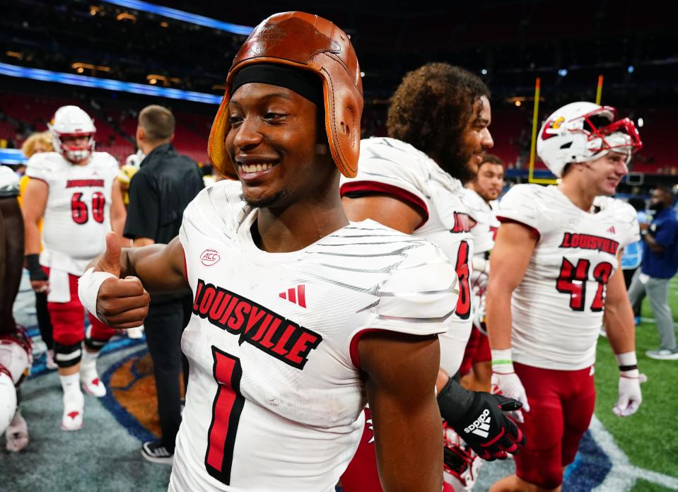 Louisville wide receiver Jamari Thrash, wearing a leather helmet given to the winner of the Aflac Kickoff Game, had plenty to celebrate Friday night in Atlanta.