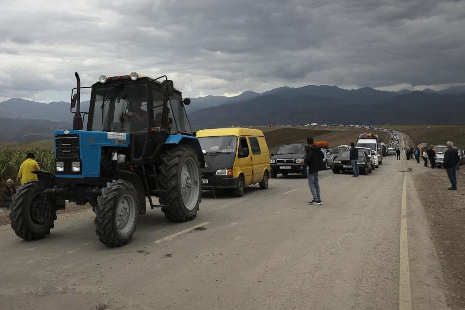 Convoy of ethnic Armenians from Nagorno-Karabakh crossing into Armenia