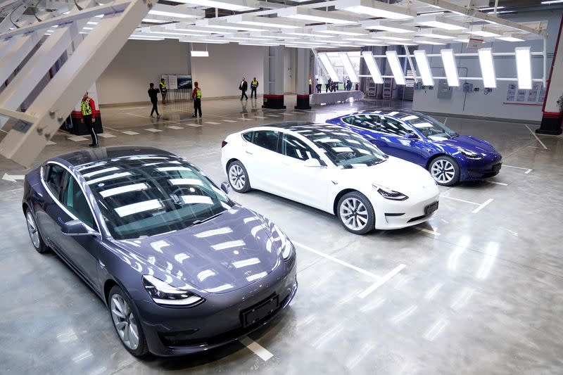 Tesla China-made Model 3 vehicles are seen during a delivery event at its factory in Shanghai