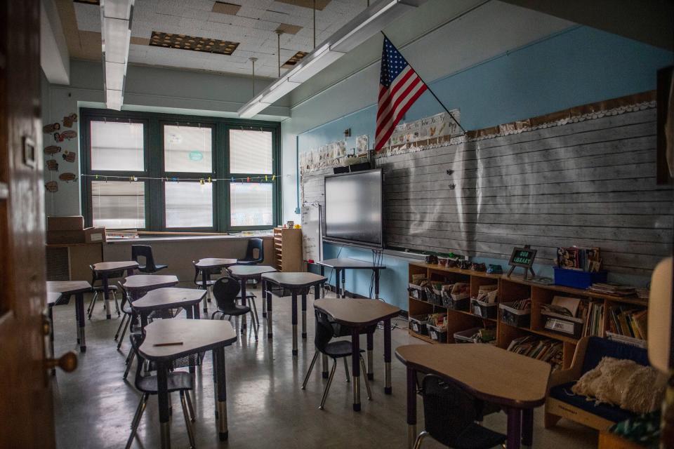 An empty elementary school classroom is seen on Tuesday, Aug. 17, 2021 in the Bronx borough of New York. Nationwide, students have been absent at record rates since schools reopened after COVID-forced closures.