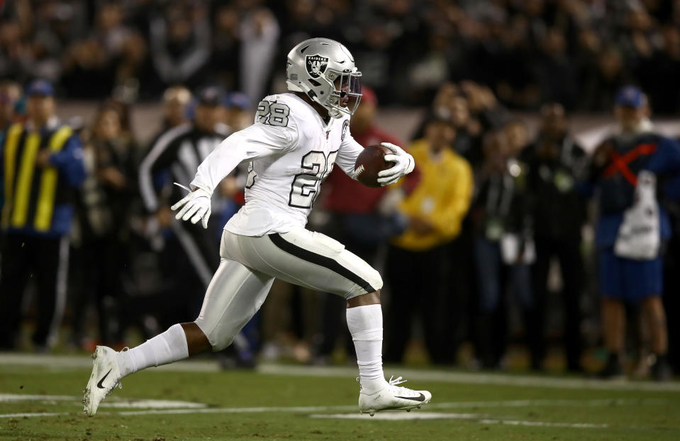 OAKLAND, CALIFORNIA - NOVEMBER 07:   Josh Jacobs #28 of the Oakland Raiders runs the ball in for the winning touchdown against the Los Angeles Chargers in the fourth quarter at RingCentral Coliseum on November 07, 2019 in Oakland, California. (Photo by Ezra Shaw/Getty Images)