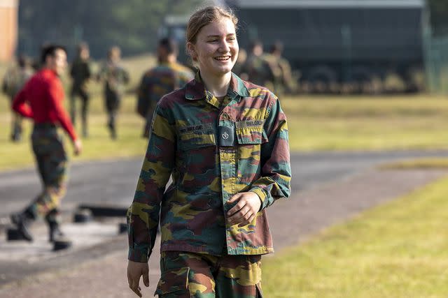 <p>Olivier Matthys/WireImage</p> Princess Elisabeth of Belgium takes part in tactical training at the Lagland military camp in 2021.