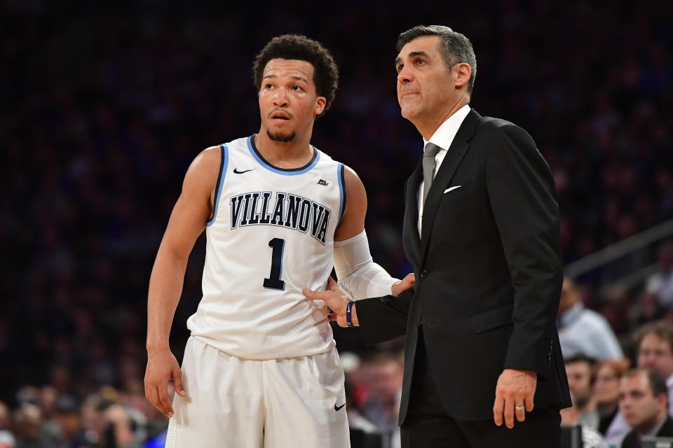 Jalen Brunson #1 speaks with Head coach Jay Wright of the Villanova Wildcats against the Seton Hall Pirates during the Big East Basketball Tournament - Semifinals at Madison Square Garden on March 10, 2017 in New York City.  (Photo by Steven Ryan/Getty Images)