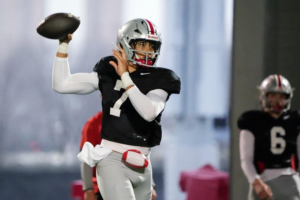 Ohio State Buckeyes quarterback C.J. Stroud passes during spring football practice.