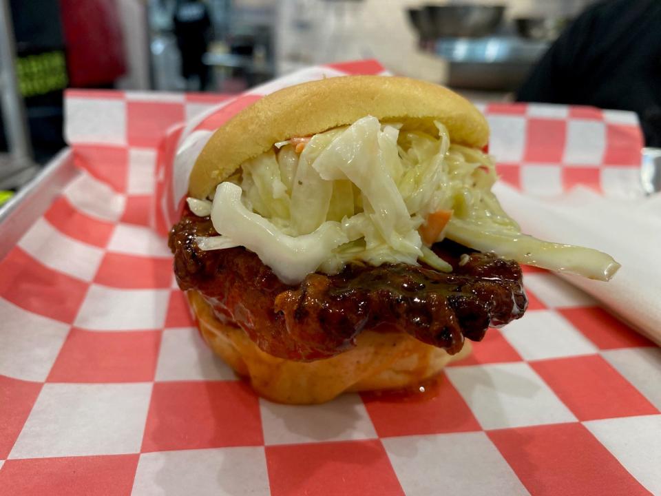 Paramus' Hot Chikn Kitchn hot chicken sandwich, hot chicken, pickles and coleslaw. The franchise opened last fall.