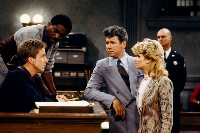 <p>NBC via Getty </p> 'Night Court' season 3: Harry Anderson as Judge Harold "Harry" T. Stonem, Charles Robinson as Macintosh "Mac" Robinson, John Larroquette as Daniel R. "Dan" Fielding, Markie Post as Christine Sullivan