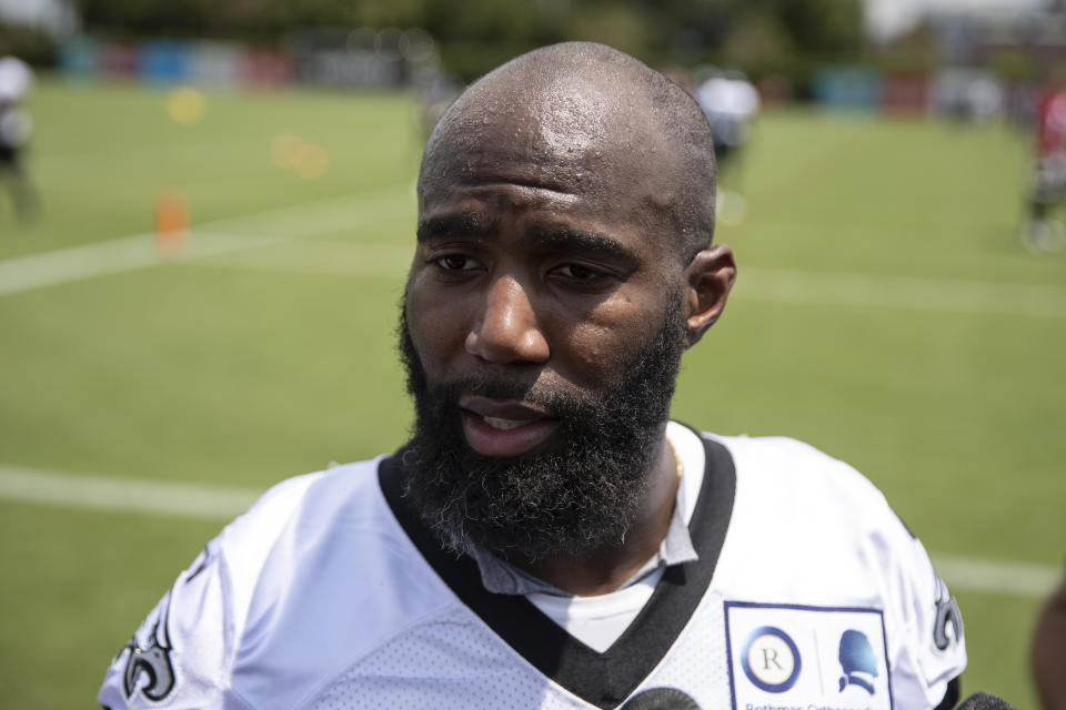 FILE - In this July 25, 2019, file photo, Philadelphia Eagles strong safety Malcolm Jenkins speaks with members of the media at the NFL football team's training camp, in Philadelphia. Veteran defensive backs and team leaders Richard Sherman of San Francisco and Malcolm Jenkins of Philadelphia are among 32 nominees for the Walter Payton NFL Man of the Year Award.(AP Photo/Matt Rourke, File)