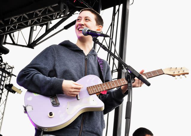 <p>Matt Cowan/Getty</p> Singer Greta Kline of Frankie Cosmos performs on stage at the Growlers 6 festival on October 29, 2017.