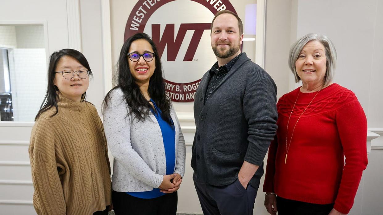 Dr. Malvika Behl, second from left, is leading research into parents of children with dyslexia and other disabilities after winning a Richard and Mary West Traylor Research Grant from West Texas A&M University's Center for Learning Disabilities. Also pictured are fellow researchers Dr. Mikyung Shin, Dr. Kenneth Denton and Dr. Betty Coneway.