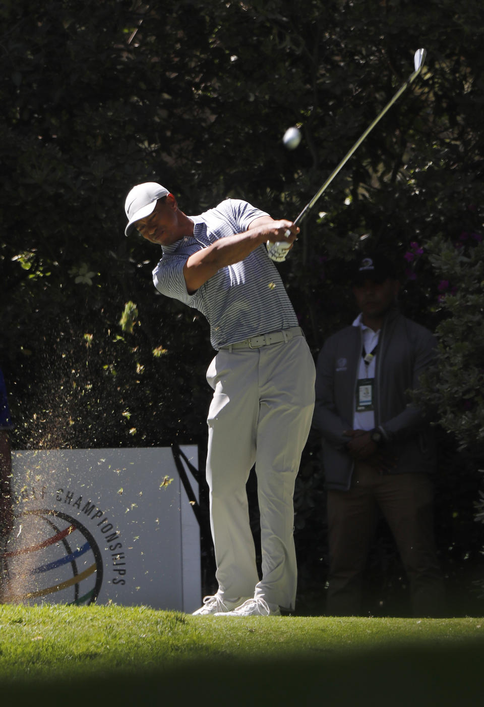 Tiger Woods hits the ball on the second hole during the first day of competition of the WGC-Mexico Championship at the Chapultepec Golf Club in Mexico City, Thursday, Feb. 21, 2019. (AP Photo/Marco Ugarte)