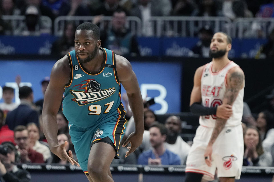 Detroit Pistons forward Eugene Omoruyi (97) reacts after a three-point basket during the second half of an NBA basketball game against the Miami Heat, Tuesday, April 4, 2023, in Detroit. (AP Photo/Carlos Osorio)