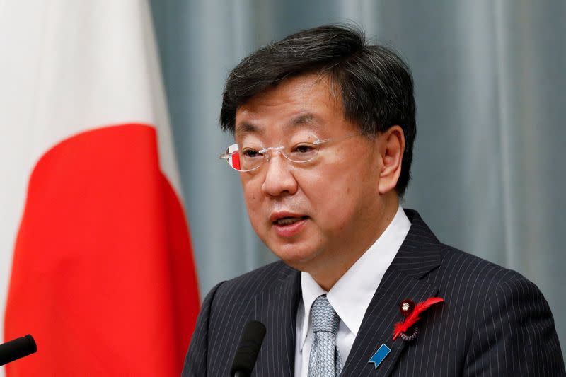 FILE PHOTO: Japan's new Chief of Cabinet Secretary Matsuno Hirokazu announces new cabinet members, in Tokyo