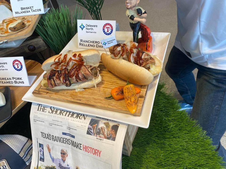 The Ranchero Chile Relleno Dawwg on display at Globe Life field. The hot dog is stuff with queso and wrapped in bacon.