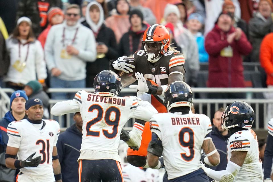 Browns tight end David Njoku jumps trying to avoid a tackle in the second half against the Bears, Sunday, Dec. 17, 2023, in Cleveland.