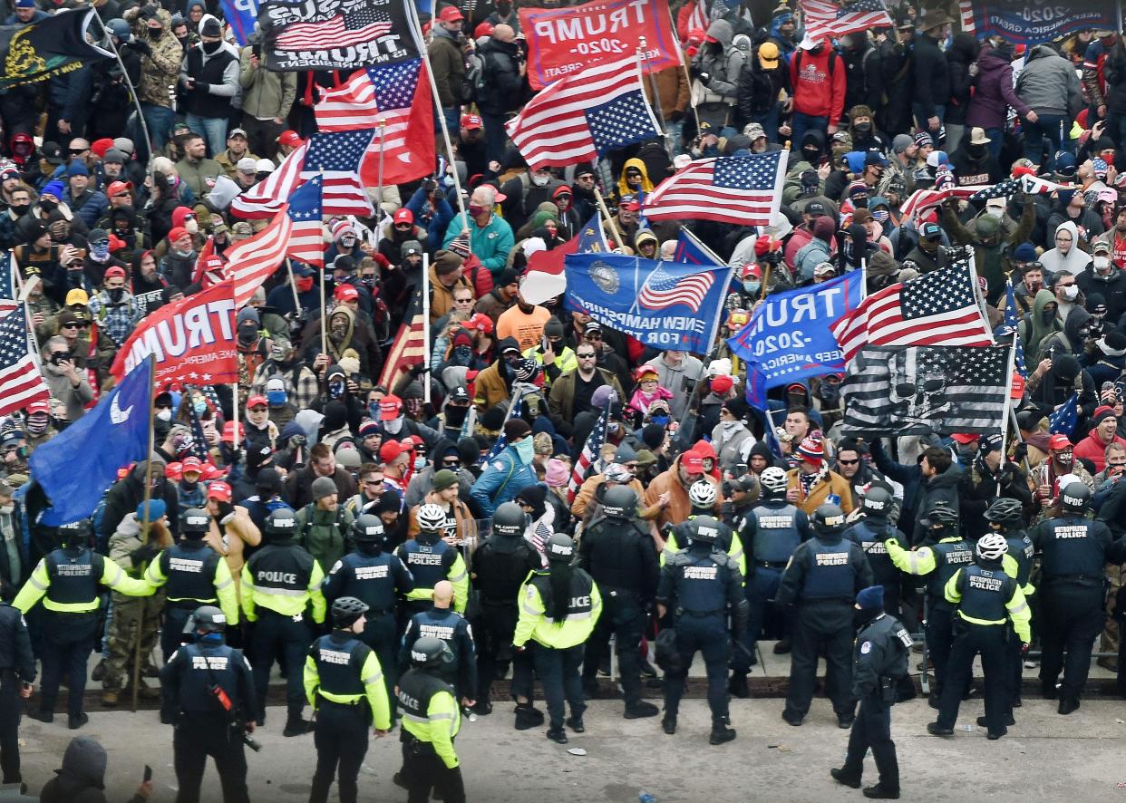 Following an incendiary speech by then-President Donald Trump on the National Mall, a mob of his supporters descended on the Capitol and broke through the ranks of police and barriers. Five people, including a Capitol policeman, lost their lives due to the riot. (Photo: OLIVIER DOULIERY via Getty Images)