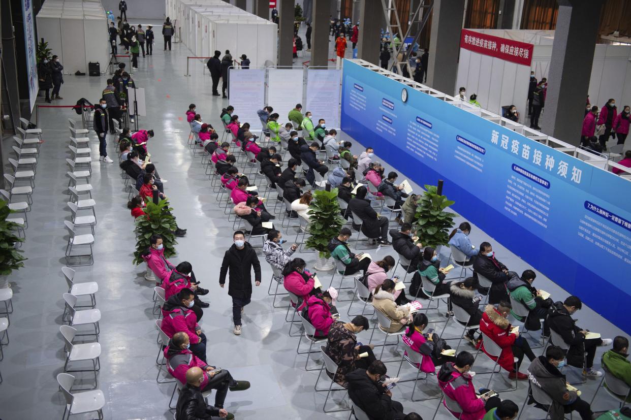 In this photo released by Xinhua News Agency, residents wait for 30 minutes at an observation point after receiving their COVID-19 vaccinations at a temporary vaccination site in Beijing, China on Saturday, Jan. 2, 2021. China authorized its first homegrown COVID-19 vaccine for general use on Dec. 31, 2020, adding another shot that could see wide use in poorer countries as the virus surges back around the globe.