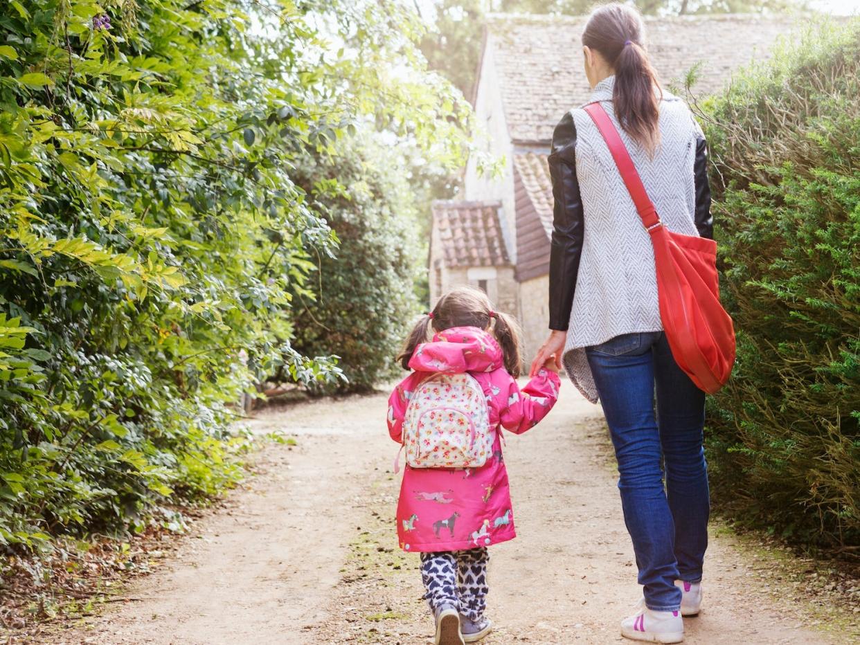 mother and daughter walking