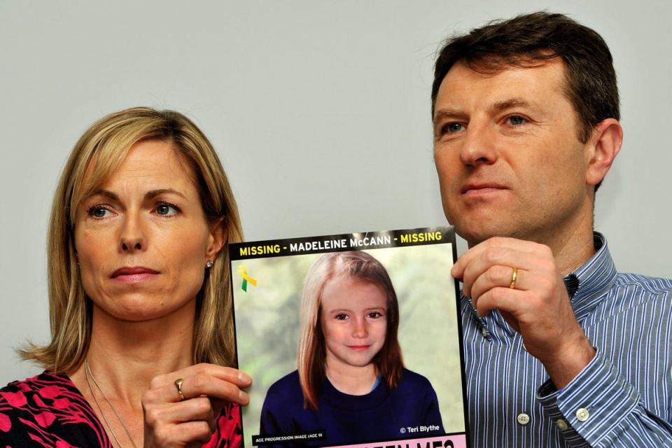 Kate and Gerry McCann with an updated poster of what police believed Madeleine would look like at age 9 (John Stilwell / PA Archive)