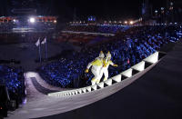 <p>North Korea’s Jong Su Hyon, left, and South Korea’s Park Jong-ah carry the torch during the opening ceremony of the 2018 Winter Olympics in Pyeongchang, South Korea, Friday, Feb. 9, 2018. (AP Photo/David J. Phillip,Pool) </p>