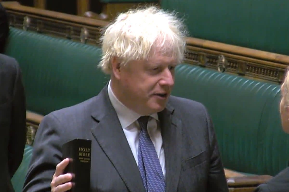 Former prime minister Boris Johnson pledges allegiance to the King (House of Commons/PA) (PA Wire)