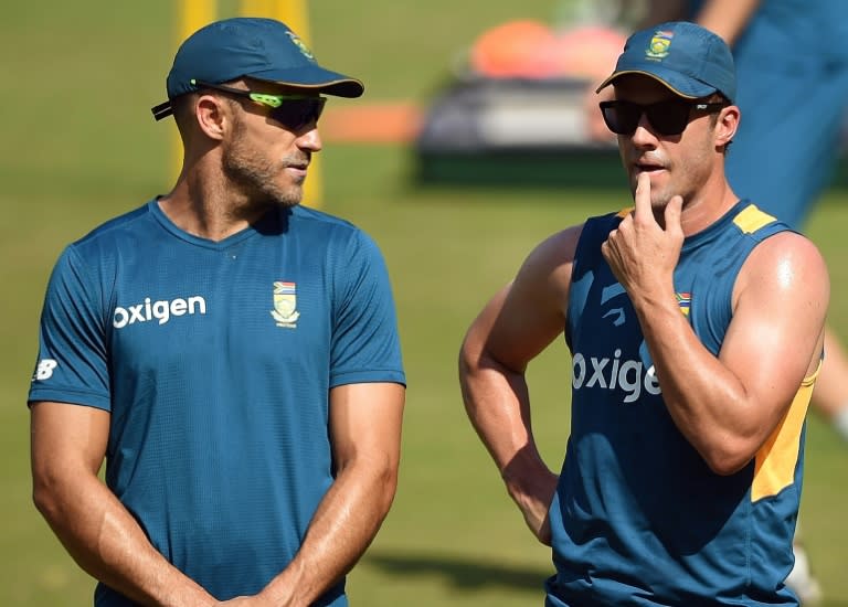 South African captain Faf du Plessis (left) speaks with teammate AB de Villiers during a training session in Mumbai on March 17, 2016