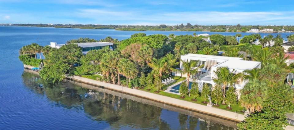 Developer Richard Fertig just sold a new contemporary-style house, right, at 2291 Ibis Isle Road E. on the South End of Palm Beach for a recorded $12.5 million.