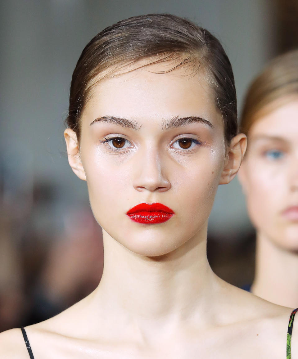<p>Always one to favor a red lip, Wu's girls rocked a two-toned glossy version, courtesy of Yadim and his Maybelline spread.</p>