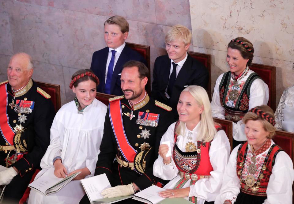 Princess Ingrid Alexandra was all smiles at the confirmation ceremony, seated between her grandfather and father.