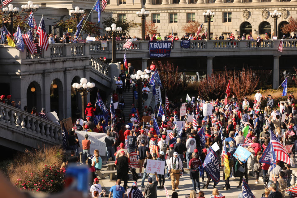 Trump supporters, QAnon believers and members of far-right militia groups gathered outside the Pennsylvania state Capitol, falsely claiming that Biden had won the election due to widespread voter fraud.  (Photo: Spencer Platt via Getty Images)