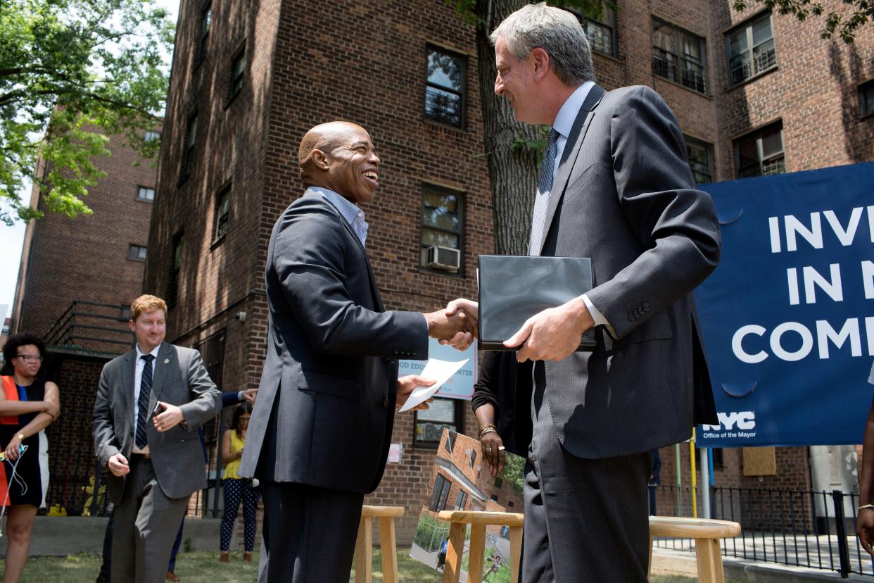 Some progressives see Adams' ties to Mayor Bill de Blasio, right, as a selling point. Others see it as a sign that he would have more of de Blasio's flaws than Yang would. (Photo: Andrew Lichtenstein/Getty Images)