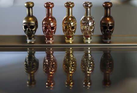 E-cigarette mouthpieces in the style of skulls are seen in the offices of British e-cigarette company Totally Wicked in Blackburn, northern England March 19, 2015. REUTERS/Phil Noble