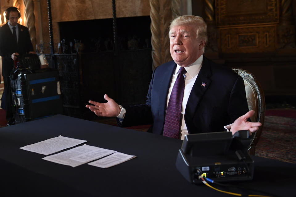 President Donald Trump speaks to reporters following his teleconference with troops from his Mar-a-Lago estate in Palm Beach, Fla., Thursday, Nov. 22, 2018. (AP Photo/Susan Walsh)