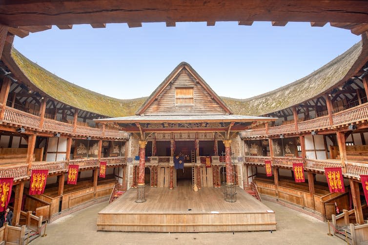 Interior shot of Shakespeare's open air Globe theatre showing its round shape.