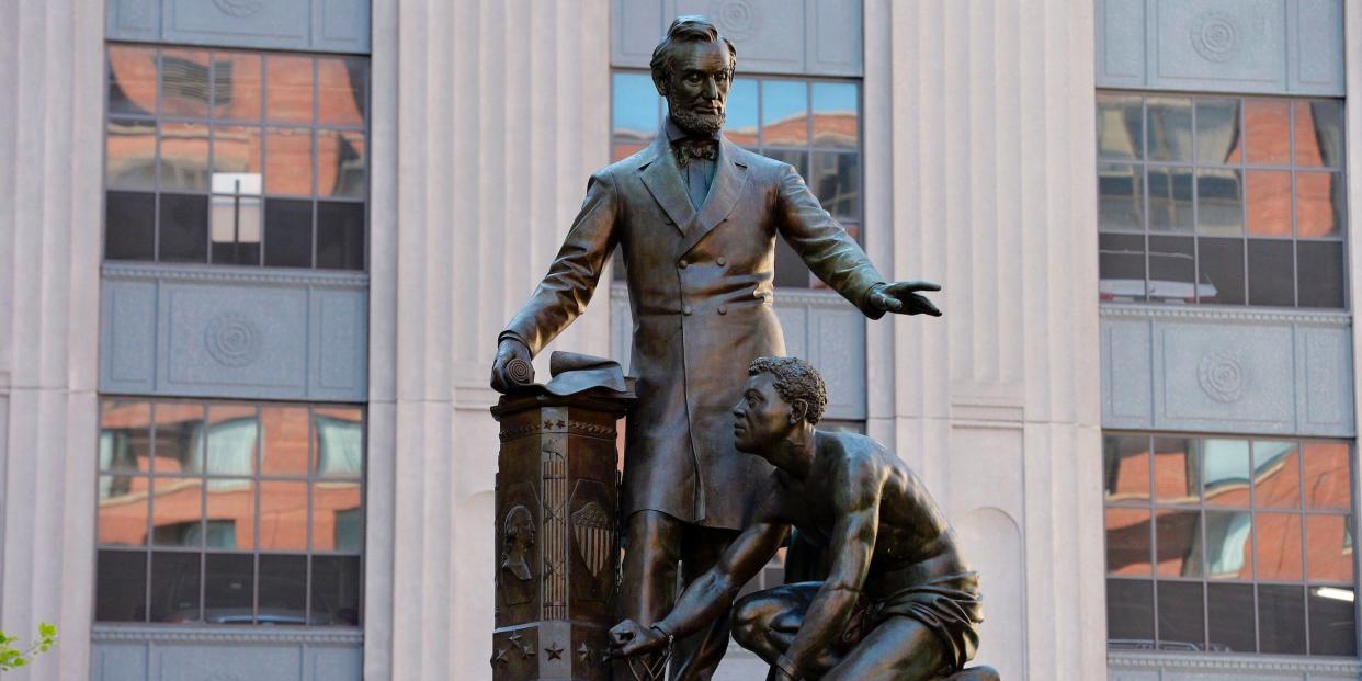 The Abraham Lincoln Statue, erected in 1879, by Thomas Ball, is viewed in Park Square in Boston, Massachusetts on June 16, 2020.
